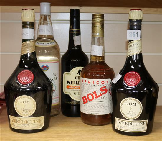 One bottle of Mount Gay rum, a bottle of Bols Apricot brandy, a bottle of Amontillado sherry and two bottles of DOM Benedictine